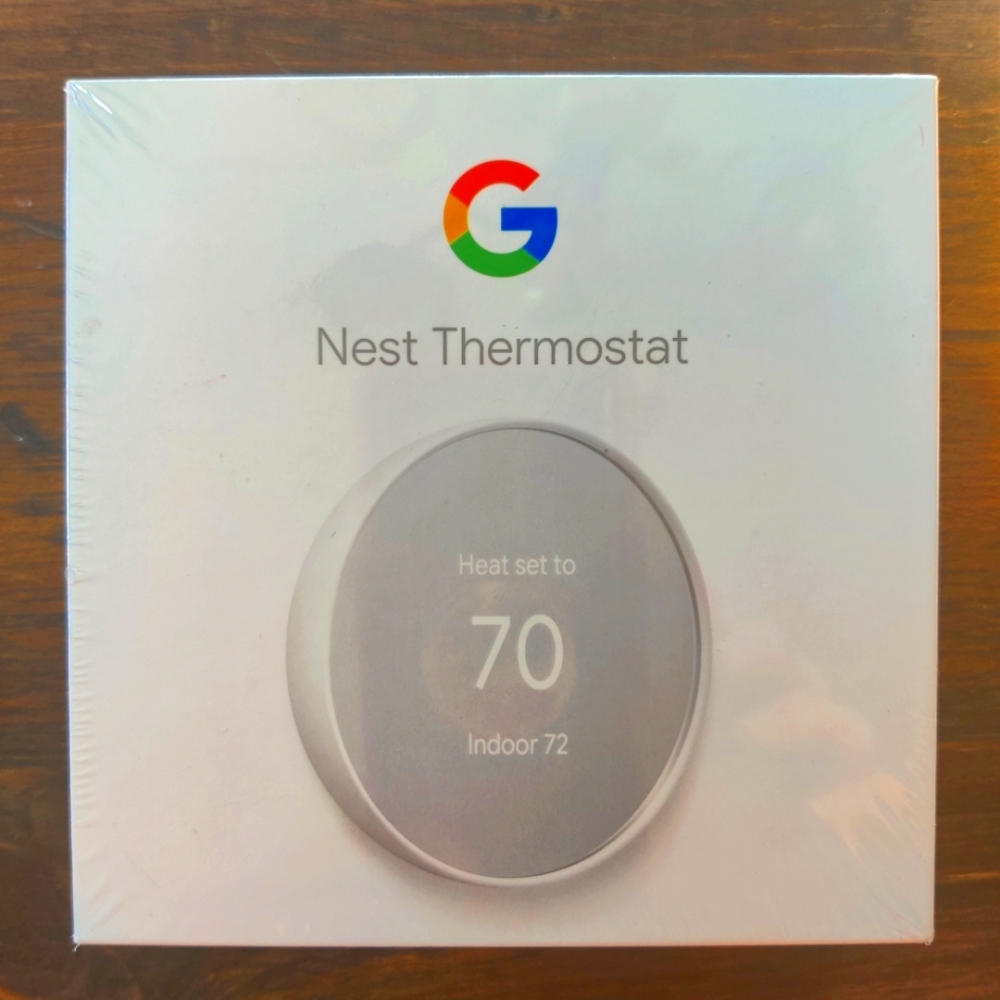 Brand new Google Nest thermostat still in packaging